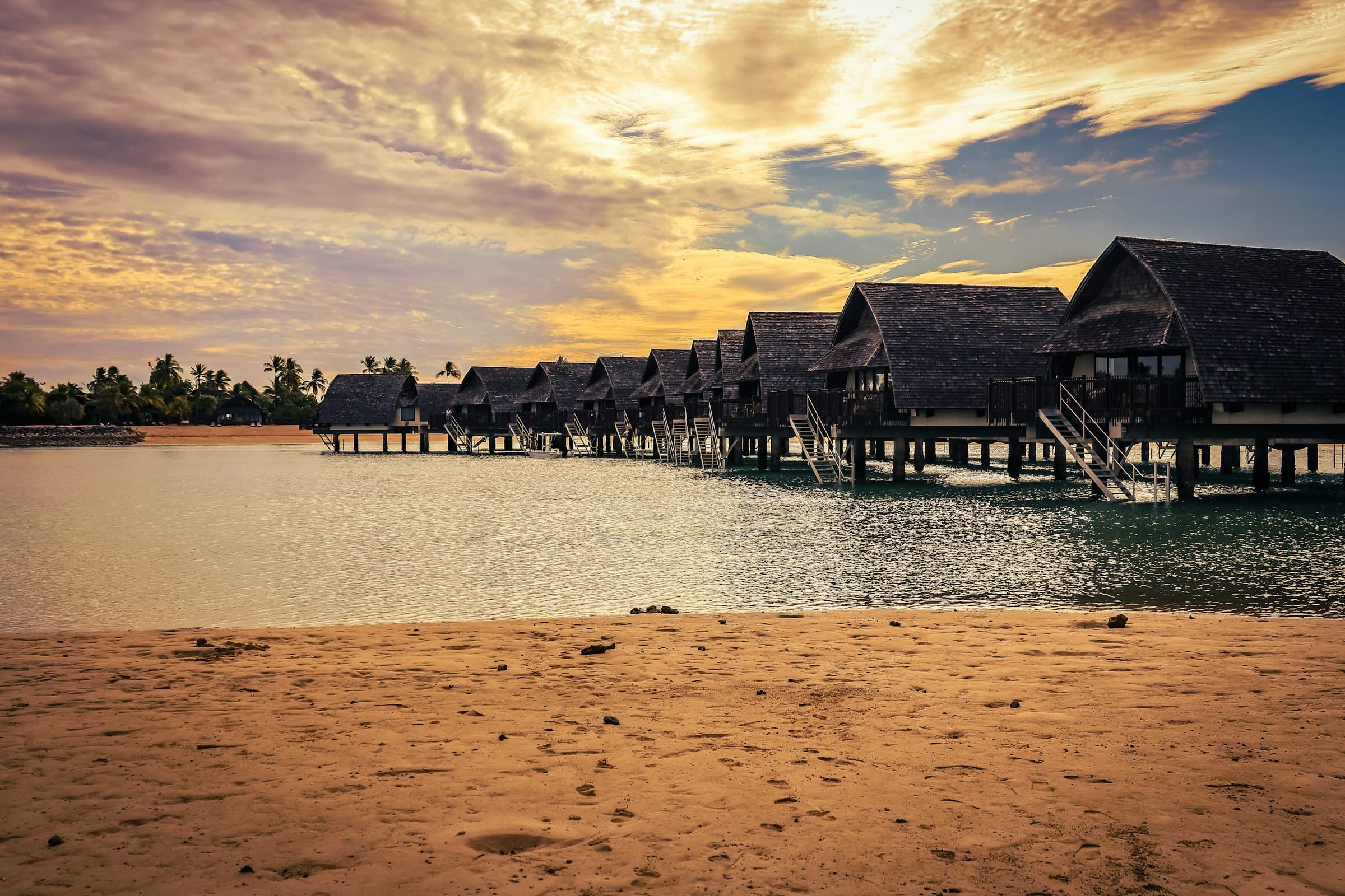 A quiet walkway over turquoise water